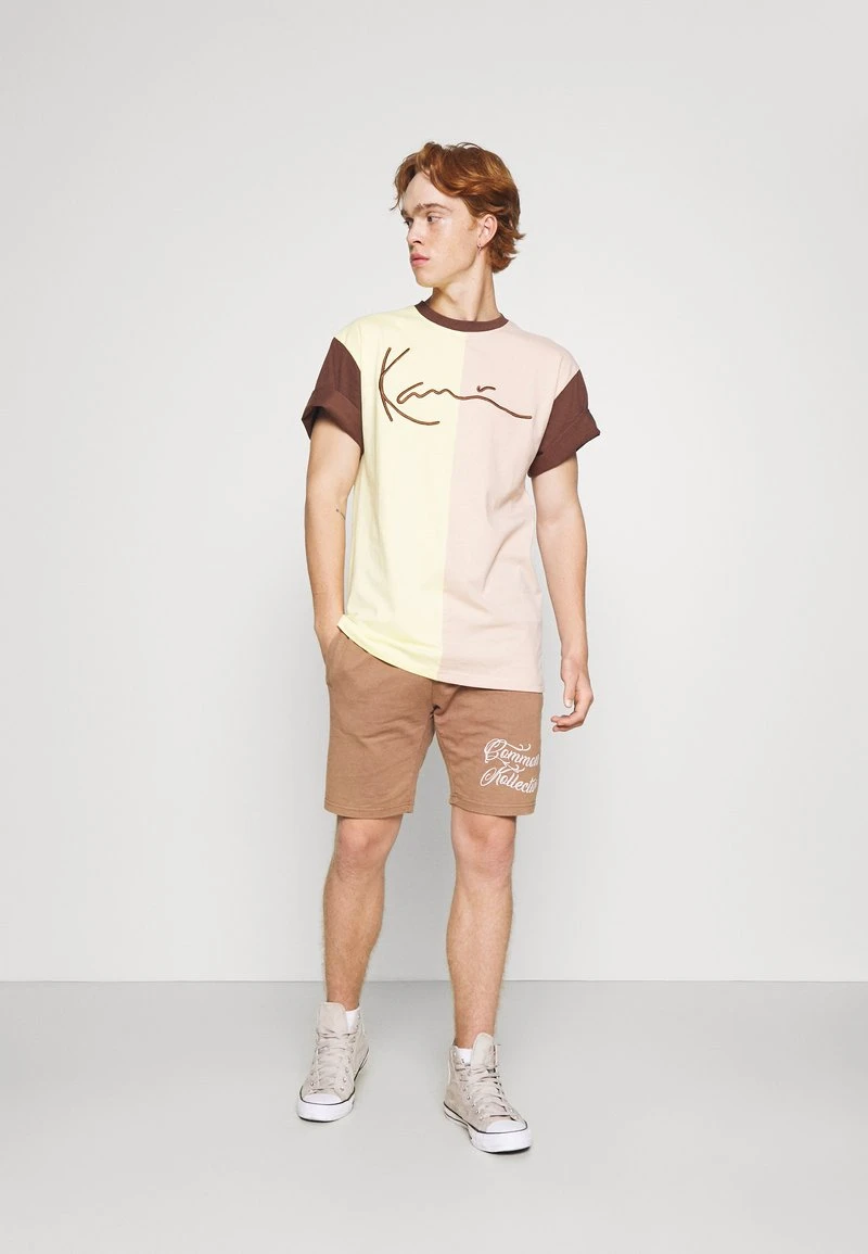 Karl Kani UNISEX SIGNATURE BLOCK TEE - T-Shirt Print - Light Yellow 4 Karl Kani UNISEX SIGNATURE BLOCK TEE - T-Shirt Print - Light Yellow – Bild 2
