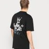 KARL KANI X SMILEY® SMALL SIGNATURE PRINT TEE - T-Shirt Print - Black, Unisex -Outlet KARL KANI Store 06761292cf184adfa2b0b368d87b5b48