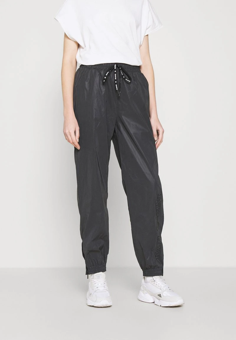 Karl Kani RETRO REFLECTIVE TRACKPANTS - Jogginghose - Black, Damen 3 Karl Kani RETRO REFLECTIVE TRACKPANTS - Jogginghose - Black, Damen