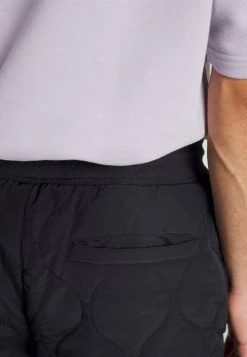 Karl Kani SMALL SIGNATURE QUILTED PANTS UNISEX - Stoffhose - Black 11 Karl Kani SMALL SIGNATURE QUILTED PANTS UNISEX - Stoffhose - Black -Outlet KARL KANI Store 09db5697fdd946fbb5043694a4f90615