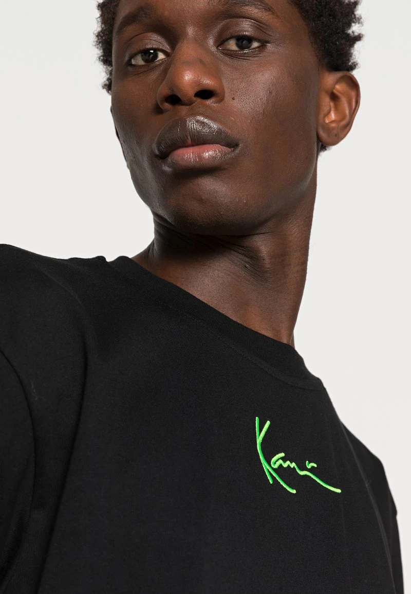 Karl Kani SMALL SIGNATURE TEE UNISEX - T-Shirt Print - Black 7 Karl Kani SMALL SIGNATURE TEE UNISEX - T-Shirt Print - Black – Bild 5