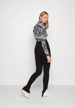 Karl Kani RETRO SLIT - Leggings - Hosen - Black, Damen 10 Karl Kani RETRO SLIT - Leggings - Hosen - Black, Damen -Outlet KARL KANI Store 0eacde8b63964c95888b220c38b4cb21