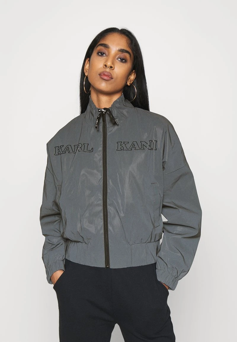 RETRO REFLECTIVE TRACKJACKET - Leichte Jacke - black Karl Kani RETRO REFLECTIVE TRACKJACKET - Leichte Jacke - Black, Damen -Outlet KARL KANI Store 0f4ae85841704b9ab3670630278b956c