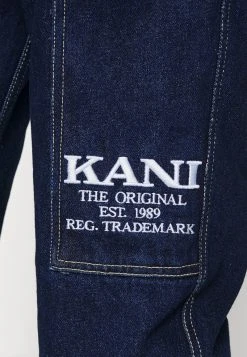Karl Kani RETRO RINSED PANTS UNISEX - Jeans Relaxed Fit - Dark Blue -Outlet KARL KANI Store 1193c92c7a9c47c0a7758ece4cf53172