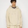 Karl Kani SMALL SIGNATURE UNISEX - Sweatshirt - Light Sand 1 Karl Kani SMALL SIGNATURE UNISEX - Sweatshirt - Light Sand -Outlet KARL KANI Store 17c908fc093644fba4c8804574a68684