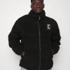 Karl Kani RETRO PUFFER JACKET UNISEX - Winterjacke - Black 1 Karl Kani RETRO PUFFER JACKET UNISEX - Winterjacke - Black -Outlet KARL KANI Store 246d7d4bba0e4e269d6429906f2d98d8