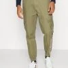 Karl Kani RETRO WASHED PANTS - Cargohose - Dark Green, Herren -Outlet KARL KANI Store 344b144233d240dab0336f81d10b5c9d