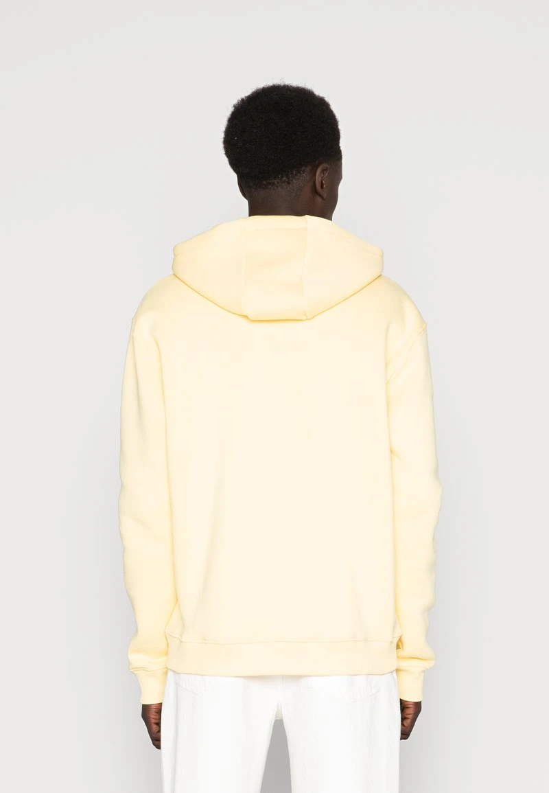 Karl Kani SMALL SIGNATURE ESSENTIAL HOODIE UNISEX - Kapuzenpullover - Light Yellow 5 Karl Kani SMALL SIGNATURE ESSENTIAL HOODIE UNISEX - Kapuzenpullover - Light Yellow – Bild 3