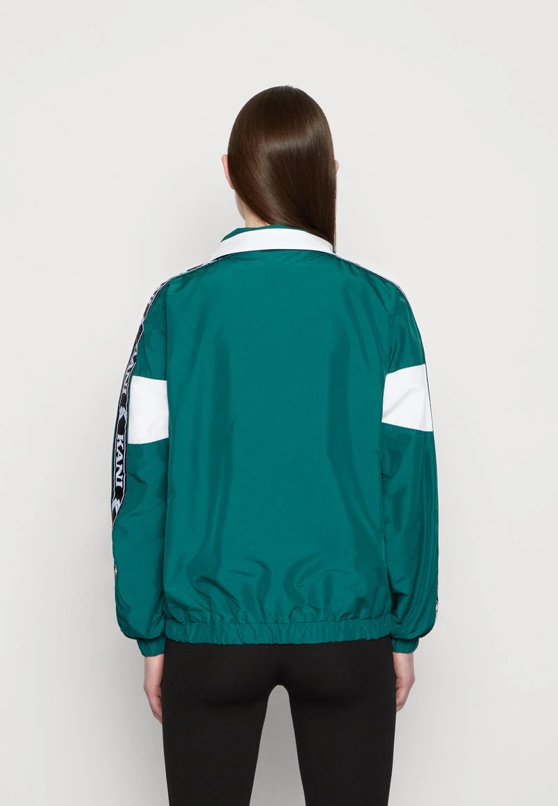 TRACKJACKET - Leichte Jacke - dark green Karl Kani TRACKJACKET - Leichte Jacke - Dark Green, Damen -Outlet KARL KANI Store 3b42d358b9284f5aabc1fe550b7419c9