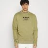 Karl Kani RETRO WASHED CREW UNISEX - Sweatshirt - Dark Green 2 Karl Kani RETRO WASHED CREW UNISEX - Sweatshirt - Dark Green -Outlet KARL KANI Store 3c09db2787a541739a7acb7f5236309b