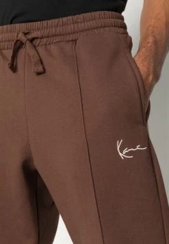 Karl Kani SMALL SIGNATURE - Jogginghose - Brown, Herren 11 Karl Kani SMALL SIGNATURE - Jogginghose - Brown, Herren -Outlet KARL KANI Store 3c5c9e719e8e4b7bacdb13a3798bc9bf