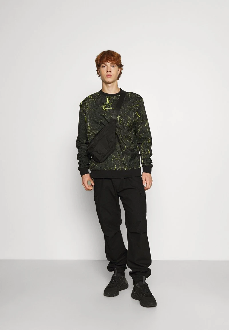 UNISEX SMALL SIGNATURE NEON CREW - Sweatshirt - black Karl Kani UNISEX SMALL SIGNATURE NEON CREW - Sweatshirt - Black -Outlet KARL KANI Store 4773a1eb3b4b4b9c9ba261bd61bc047b