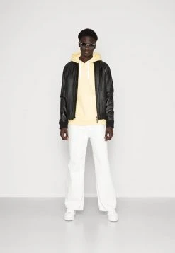 Karl Kani SMALL SIGNATURE ESSENTIAL HOODIE UNISEX - Kapuzenpullover - Light Yellow 8 Karl Kani SMALL SIGNATURE ESSENTIAL HOODIE UNISEX - Kapuzenpullover - Light Yellow -Outlet KARL KANI Store 4b2c4ef939db4a4c8a3cc4fcbf773788