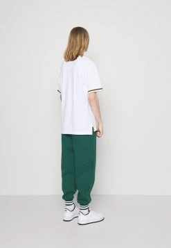 Karl Kani SMALL SIGNATURE TEE - Poloshirt - White, Herren -Outlet KARL KANI Store 4c1ad2aaf5654a35b1175950436dcf69