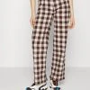 Karl Kani RETRO WIDE LEG CHECK PANTS - Stoffhose - Sand, Damen