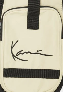 Karl Kani SIGNATURE UTILITY VEST BAG UNISEX - Umhängetasche - Sand -Outlet KARL KANI Store 5a2944c740304018a54dda6c72154280