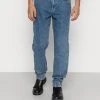 Karl Kani SMALL SIGNATURE TAPERED FIVE POCKET - Jeans Tapered Fit - Vintage Indigo, Herren 2 Karl Kani SMALL SIGNATURE TAPERED FIVE POCKET - Jeans Tapered Fit - Vintage Indigo, Herren -Outlet KARL KANI Store 5aea1f1bc9d143f682886a5ff7b5cff3