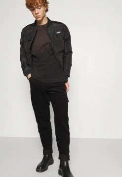 Karl Kani UNISEX RETRO PANTS - Stoffhose - Black 5 Karl Kani UNISEX RETRO PANTS - Stoffhose - Black -Outlet KARL KANI Store 64183f10f8da483da05edaf87fb34adb