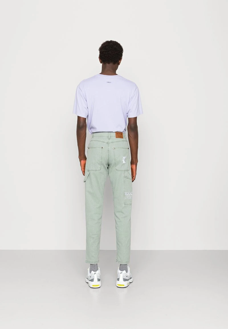 Karl Kani PANTS UNISEX - Jeans Tapered Fit - Dark Mint 5 Karl Kani PANTS UNISEX - Jeans Tapered Fit - Dark Mint – Bild 3