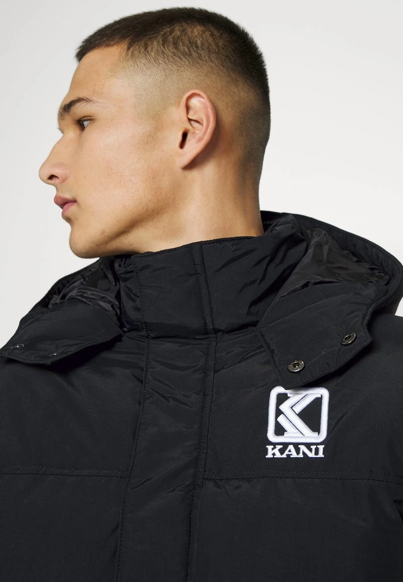 Karl Kani LONG HOODED PUFFER JACKET UNISEX - Wintermantel - Black 8 Karl Kani LONG HOODED PUFFER JACKET UNISEX - Wintermantel - Black – Bild 6