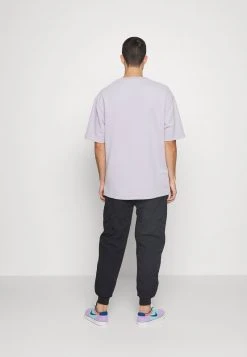 Karl Kani SMALL SIGNATURE QUILTED PANTS UNISEX - Stoffhose - Black 10 Karl Kani SMALL SIGNATURE QUILTED PANTS UNISEX - Stoffhose - Black -Outlet KARL KANI Store 6c744fdf8dc741f78f5d314ab707d09c