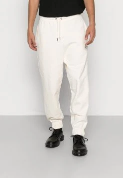 Karl Kani SMALL SIGNATURE UNISEX - Jogginghose - Cream