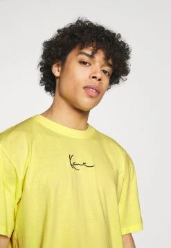 Karl Kani SMALL SIGNATURE WASHED TEE UNISEX - T-Shirt Print - Light Yellow -Outlet KARL KANI Store 76cd5edbed00460db21bb20838c6ae71