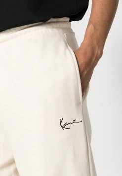 Karl Kani SMALL SIGNATURE UNISEX - Jogginghose - Cream -Outlet KARL KANI Store 800b2a8a1b7f4c8d80ea3dbcc17290cb