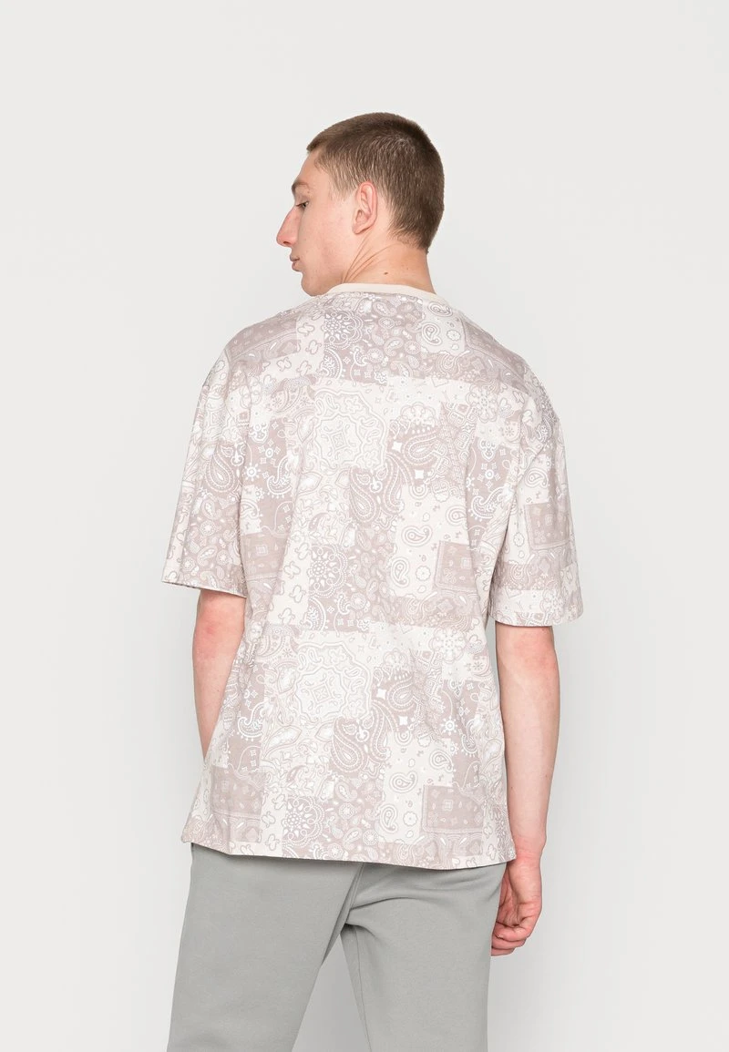 SMALL SIGNATURE TEE LIGHT UNISEX - T-Shirt print - sand Karl Kani SMALL SIGNATURE TEE LIGHT UNISEX - T-Shirt Print - Sand -Outlet KARL KANI Store 80bfdfedfd6044a68c0e42186b910445