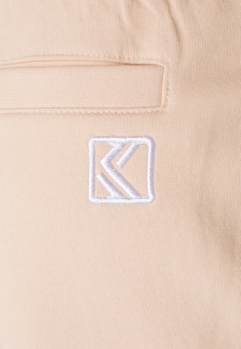UNISEX SIGNATURE - Jogginghose - rose Karl Kani UNISEX SIGNATURE - Jogginghose - Rose -Outlet KARL KANI Store 8329487ad8234d478c1e073091bb2eef