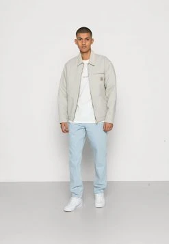 Karl Kani SMALL SIGNATURE TAPERED FIVEPOCKET - Jeans Tapered Fit - Bleached Blue, Herren -Outlet KARL KANI Store 84cbb35be7e74797b15e1279dee959f9