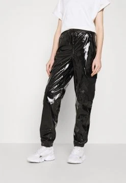 Karl Kani SIGNATURE GLOSSY PANTS - Stoffhose - Black, Damen