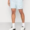 KARL KANI X SMILEY® SIGNATURE RESORT - Shorts - Bleached Blue, Herren 2 KARL KANI X SMILEY® SIGNATURE RESORT - Shorts - Bleached Blue, Herren -Outlet KARL KANI Store 8b182709d6834a869ffd9fb0e535f9e3