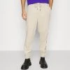 Karl Kani SIGNATURE UNISEX - Jogginghose - Light Sand 2 Karl Kani SIGNATURE UNISEX - Jogginghose - Light Sand -Outlet KARL KANI Store 90339c0602044a9ca7319210238276f7