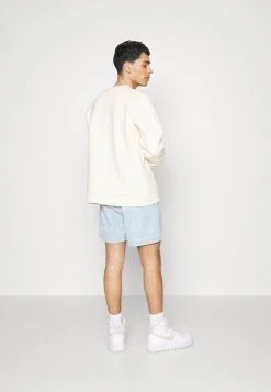 Karl Kani SMALL SIGNATURE STRIPE CREW UNISEX - Sweatshirt - Cream 15 Karl Kani SMALL SIGNATURE STRIPE CREW UNISEX - Sweatshirt - Cream -Outlet KARL KANI Store 9bd3d99e1adf4b99a141f42cb8149a71