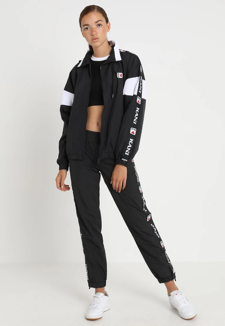 TAPE - Leichte Jacke - black/white Karl Kani TAPE - Leichte Jacke - Black/white, Damen -Outlet KARL KANI Store 9ffae167432c4561a75d8056bf9c6743
