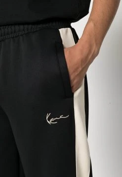 Karl Kani SMALL SIGNATURE TRACKPANTS - Jogginghose - Black, Herren -Outlet KARL KANI Store a14f2f49ad394289816fb52990b4623f