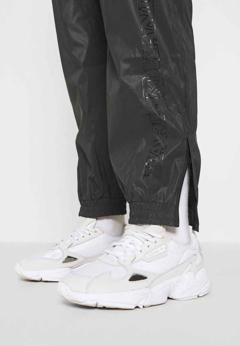Karl Kani RETRO REFLECTIVE TRACKPANTS - Jogginghose - Black, Damen 6 Karl Kani RETRO REFLECTIVE TRACKPANTS - Jogginghose - Black, Damen – Bild 4