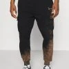 Karl Kani SMALL SIGNATURE BLEACHED UNISEX - Jogginghose - Black 2 Karl Kani SMALL SIGNATURE BLEACHED UNISEX - Jogginghose - Black -Outlet KARL KANI Store a2459c64510b47ccbf6f49db8c05bb99