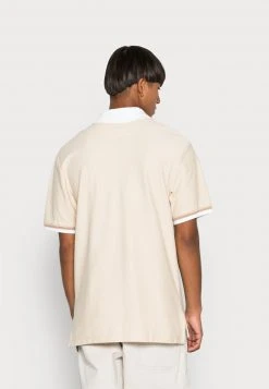 Karl Kani CHEST SIGNATURE STRIPE TEE UNISEX - Poloshirt - Cream 9 Karl Kani CHEST SIGNATURE STRIPE TEE UNISEX - Poloshirt - Cream -Outlet KARL KANI Store a2fc5ae6017c4932adbef3d2f7bf0cca