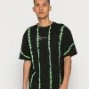 Karl Kani SMALL SIGNATURE TIE DYE TEE UNISEX - T-Shirt Basic - Black -Outlet KARL KANI Store b4911e70ba98402dba6017bd0b5e8e2c