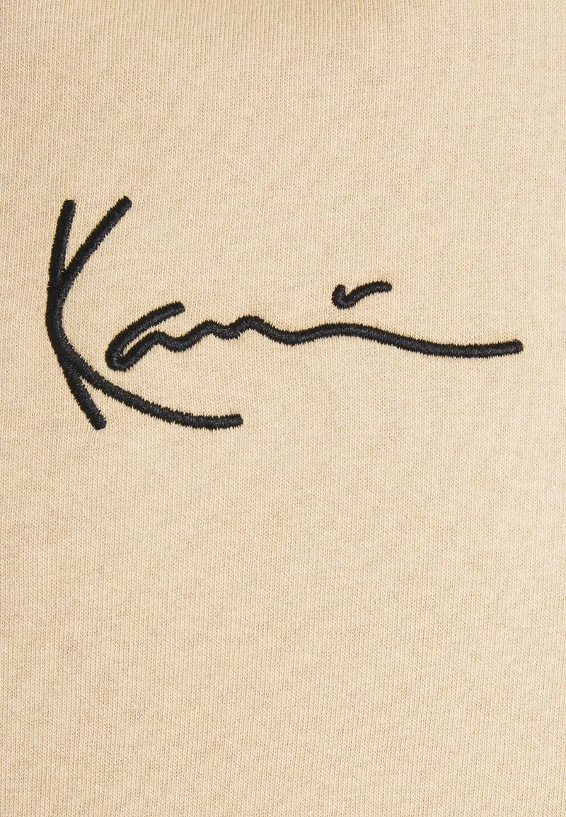 UNISEX SMALL SIGNATURE HOODY - Kapuzenpullover - sand Karl Kani UNISEX SMALL SIGNATURE HOODY - Kapuzenpullover - Sand -Outlet KARL KANI Store b6005ddaa10a4276ad1adf4d5a79d92c