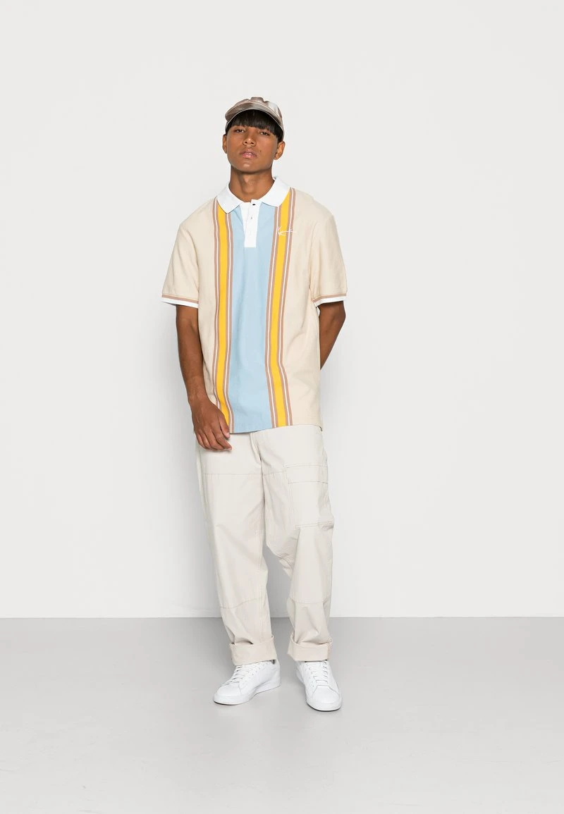 Karl Kani CHEST SIGNATURE STRIPE TEE UNISEX - Poloshirt - Cream 4 Karl Kani CHEST SIGNATURE STRIPE TEE UNISEX - Poloshirt - Cream – Bild 2