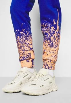 Karl Kani SIGNATURE PAINT SPLATTER - Jogginghose - Blue, Damen -Outlet KARL KANI Store c3b74110908e4aa48ff292e1d0b1de53