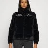 Karl Kani RETRO PUFFER JACKET - Winterjacke - Black, Damen 2 Karl Kani RETRO PUFFER JACKET - Winterjacke - Black, Damen -Outlet KARL KANI Store c3ddcf154d514fb0b6fa2a25eeaa9f88