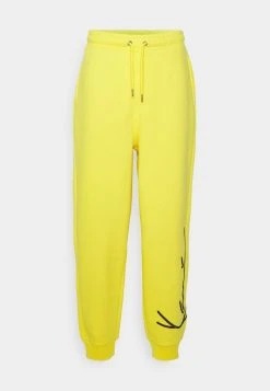 Karl Kani UNISEX SIGNATURE REGULAR FIT - Jogginghose - Yellow