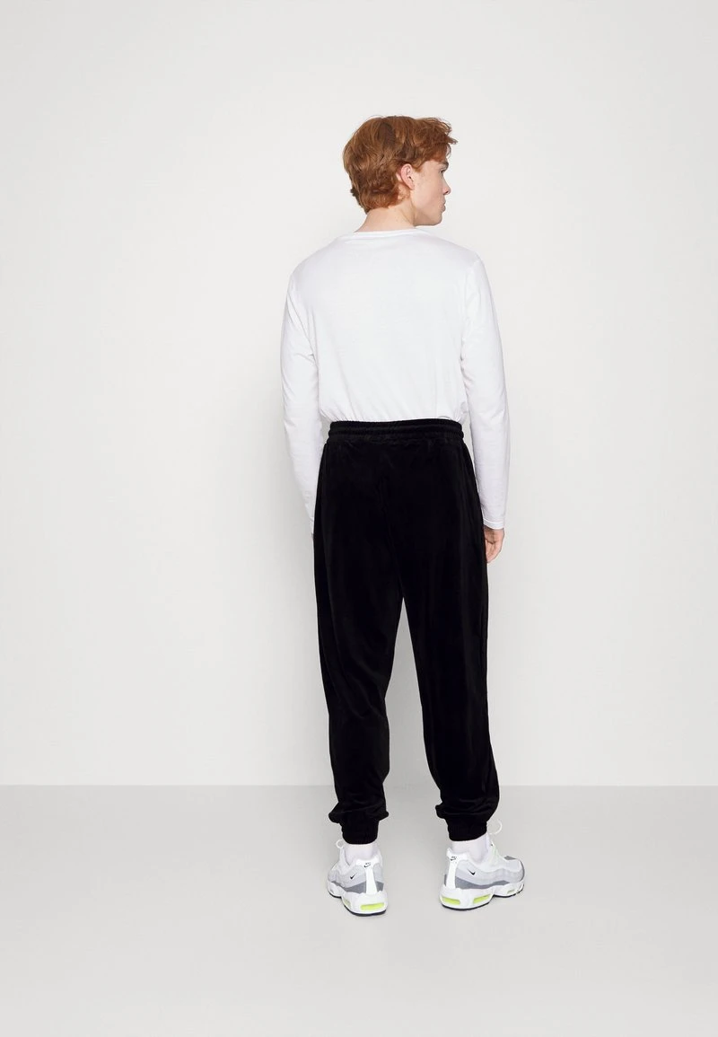 Karl Kani SMALL SIGNATURE PANTS UNISEX - Jogginghose - Black 5 Karl Kani SMALL SIGNATURE PANTS UNISEX - Jogginghose - Black – Bild 3