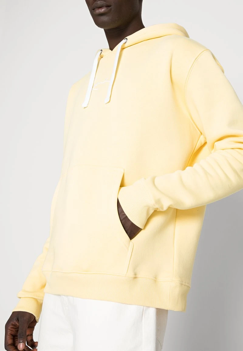 Karl Kani SMALL SIGNATURE ESSENTIAL HOODIE UNISEX - Kapuzenpullover - Light Yellow 7 Karl Kani SMALL SIGNATURE ESSENTIAL HOODIE UNISEX - Kapuzenpullover - Light Yellow – Bild 5
