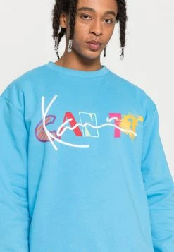 Karl Kani SIGNATURE PRINT CREW UNISEX - Sweatshirt - Blue -Outlet KARL KANI Store ded53ff3ad85437bb0d6287457750afc