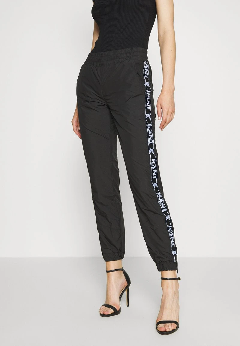 TRACKPANTS - Jogginghose - black Karl Kani TRACKPANTS - Jogginghose - Black, Damen -Outlet KARL KANI Store e22079b84e6e4def8e6fa549e616fc85